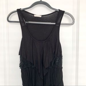 Lush black ruffle tiered tank
